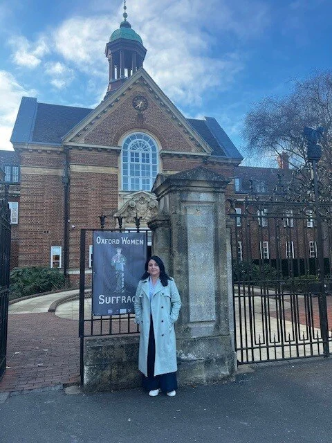 Solo at the entrance of St Hughs College Oxfor